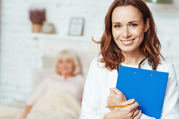 A home health nurse in Springfield, MA with a homebound senior patient